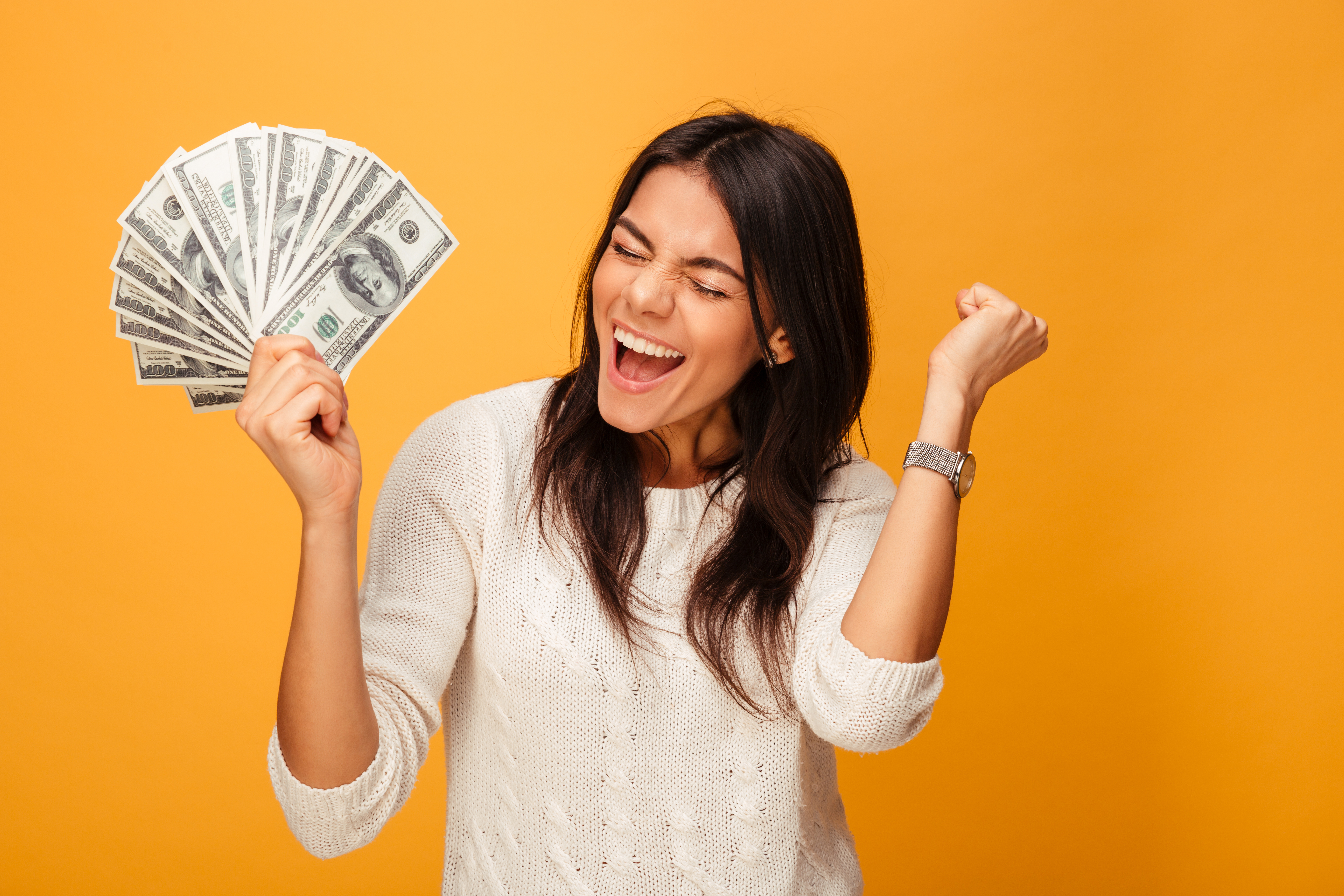 Girl holding cash